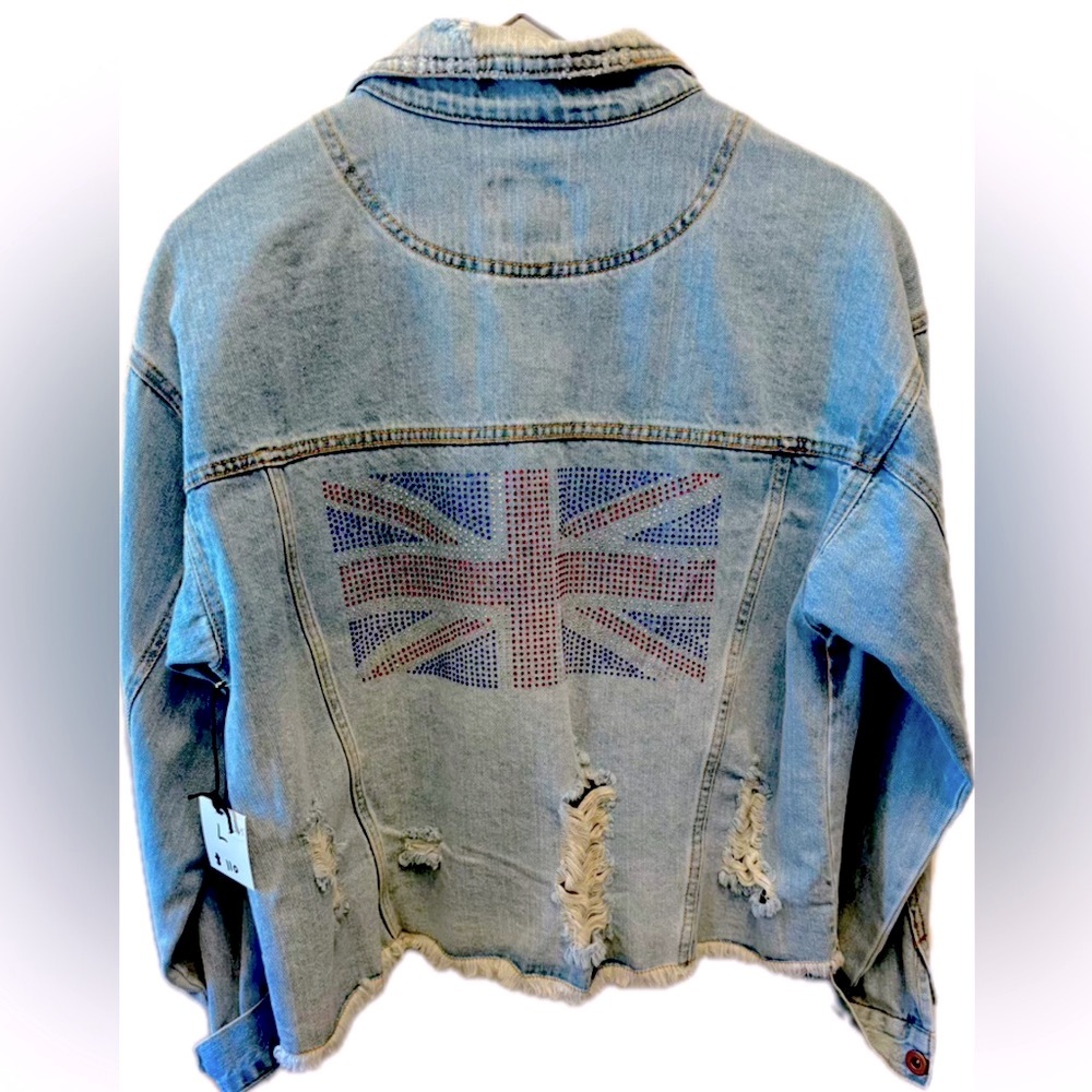 Custom never worn one of a kind denim jacket with embellishment on the back